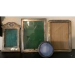 Four silver photograph frames including Art Nouveau Birmingham 1910 by Broadway & Co, 22 x 15cms,