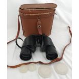 A pair of Tohyoh binoculars 7 x 50 with leather case.Condition ReportOne lens with minor blemish