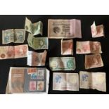 Miscellanious bank notes and stamps to include 100,000 Mark, Ten Shilling, one Pound, 5 Francs,