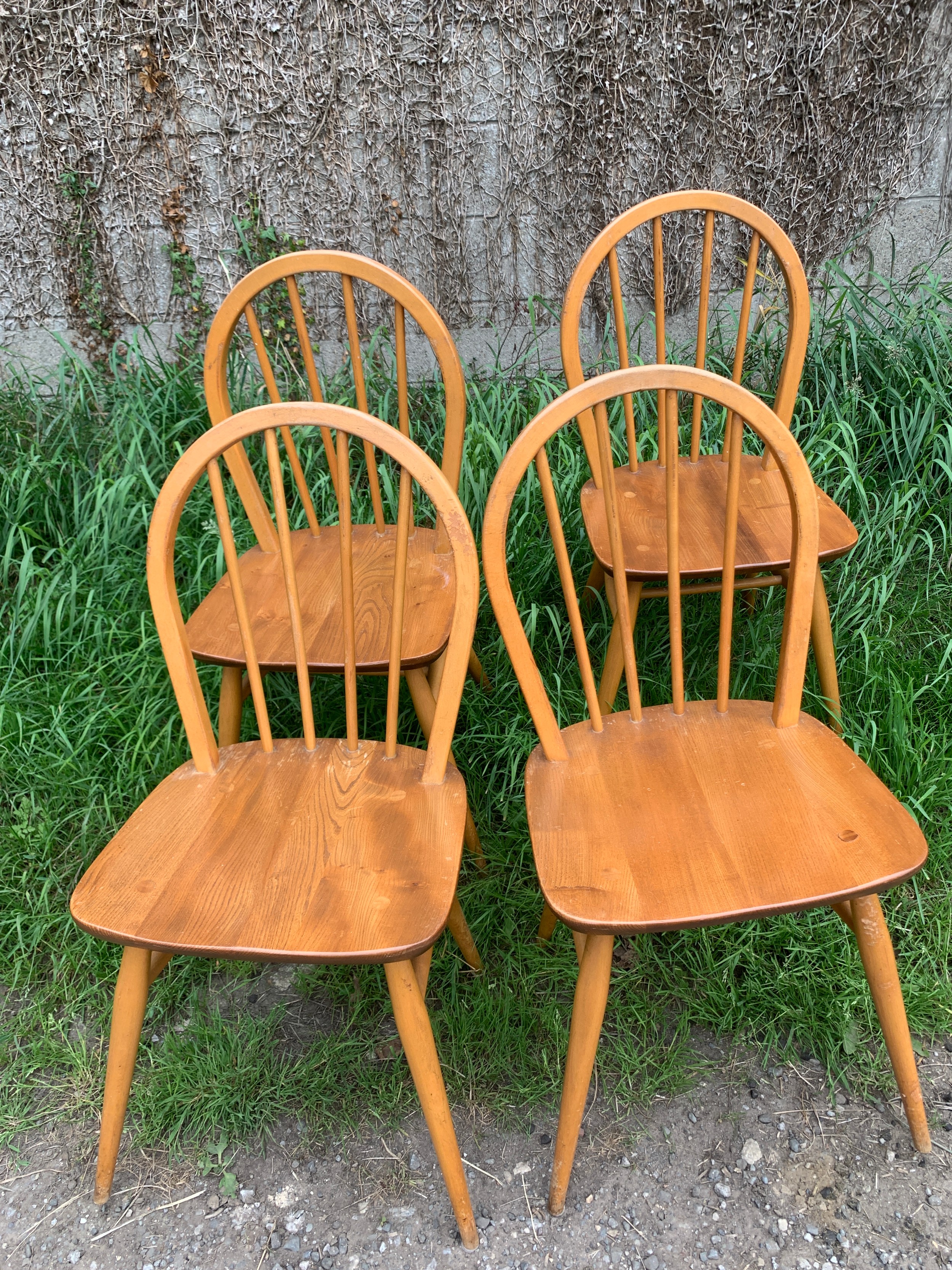 Four Ercol dining chairs.Condition ReportSome scuff marks to legs, otherwise good.