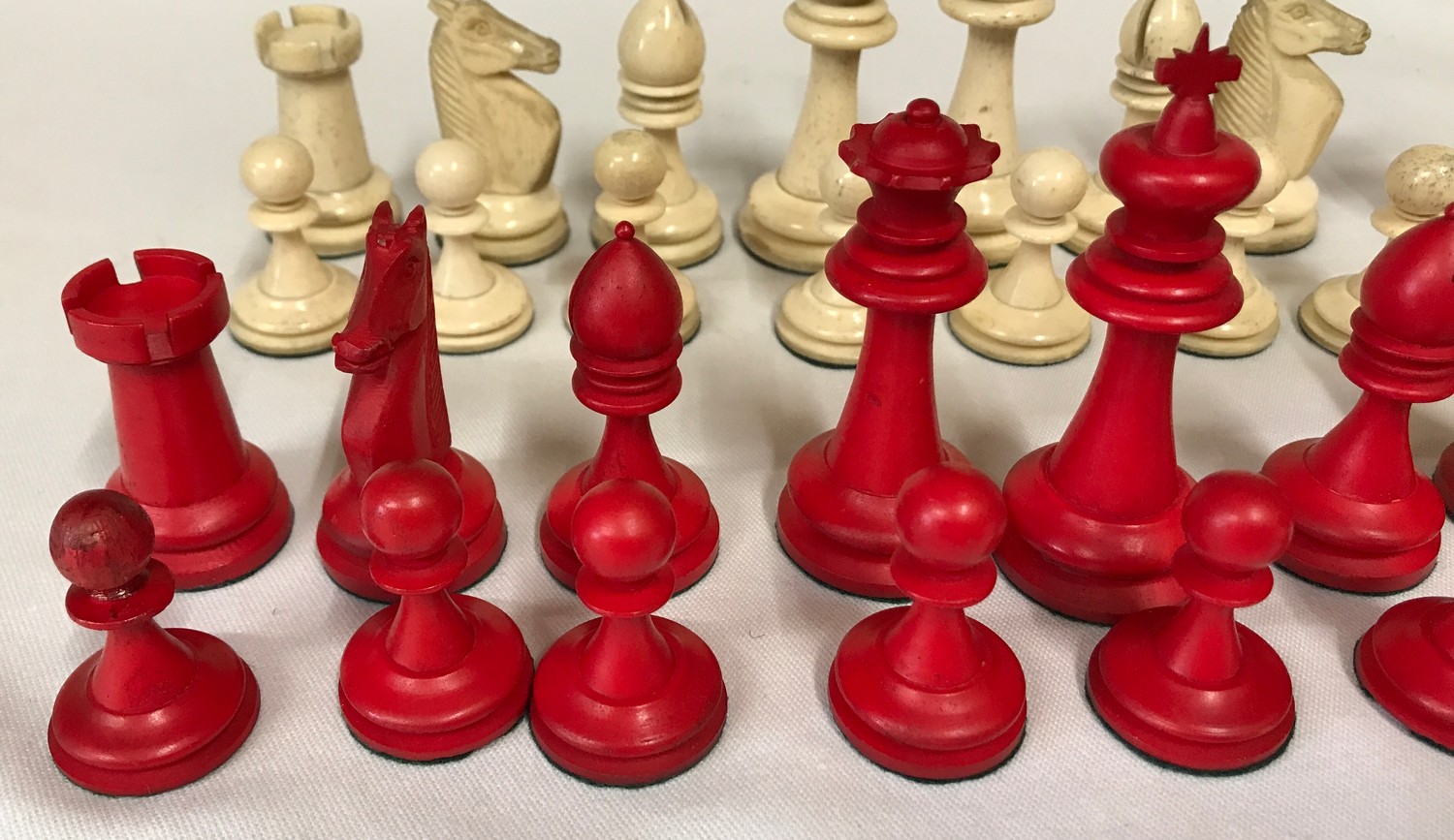 A carved bone red and white chess set. Complete.Condition ReportOne red pawn with glued tip. Overall - Image 6 of 6