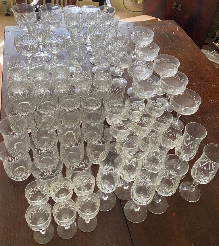 A suite of full lead crystal glasses to include 7 champagne 14cms h, 9 liqueur, 9 sherry, 10 whisky,