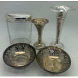 Two silver specimen vases, silver topped glass jar and a pair of pierced silver bonbon dishes,