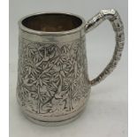 A mid to late 19thC Chinese silver tankard by Sun Shing (Xin Sheng). Vacant cartouche to front,