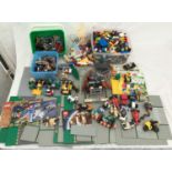 A large selection of Lego: bricks, figures, vehicles, road boards, two monoscope boards, booklets.
