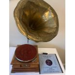 A reproduction 'His Master Voice' gramophone.Condition ReportCracks and dents to brass horn.