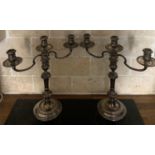 A pair of silver candelabras, London 1966/67, maker William Comyns & Sons Ltd. 1883gms total weight.