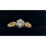 A diamond solitaire ring set in 18ct yellow gold. Size L. 2.9gms total weight. The diameter of the