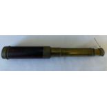 A 19thC 4 draw and rosewood telescope inscribed Davis Derby. 74cms l extended.Condition