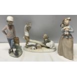 Three Nao Lladro figurines : Girl with Clown Doll 22.5cms h, Boy with Dog 23cms h and Boy and Girl