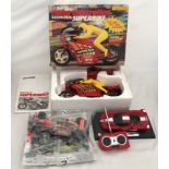 A selection of toys to include a Corgi radio controlled Honda Superbike M6200 with instructions