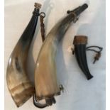 Three gunpowder horns, largest 33cms l, 28cm and small 13cm length.Condition ReportVery good