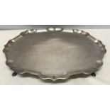 A hallmarked silver tray by CJV Ltd London 1974 on four pad feet. 41cms w x 31cms x 3.5cms h.