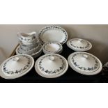 A Royal Doulton "Burgundy" dinner service comprising : 6 dinner plates, 6 medium plates and 6 side