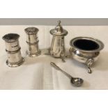 Hallmarked silver condiments to include pepper pot, mustard pot and spoon H &Co Birmingham1915