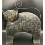 A pierced metal cat candle holder with opening door to rear. 48 h x 42cms w.Condition ReportGood