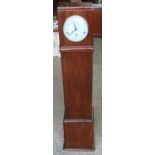 A mahogany cased granddaughter clock with Westminster chime. 126cms h x 30cms w x 21cms dCondition