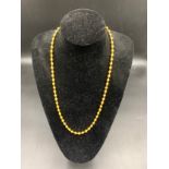 A 22ct yellow gold bead necklace 63cms l. 41.9gms.Condition ReportGood condition.