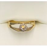 An 18ct gold diamond set ring. Size O. 3gms.Condition ReportSlight damage to top of mount.