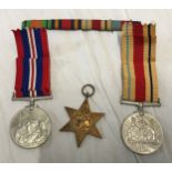 A WWII group of 3 medals to include The Defence Medal, The African Star and a Campaign together with