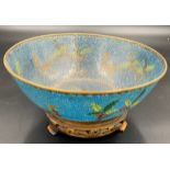 A plique à jour enamel bowl 23cms d on wooden stand and original presentation case.Condition