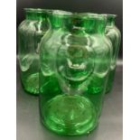 Three green glass Mason jars. 34cms h x 16cms to top.Condition ReportGood condition.