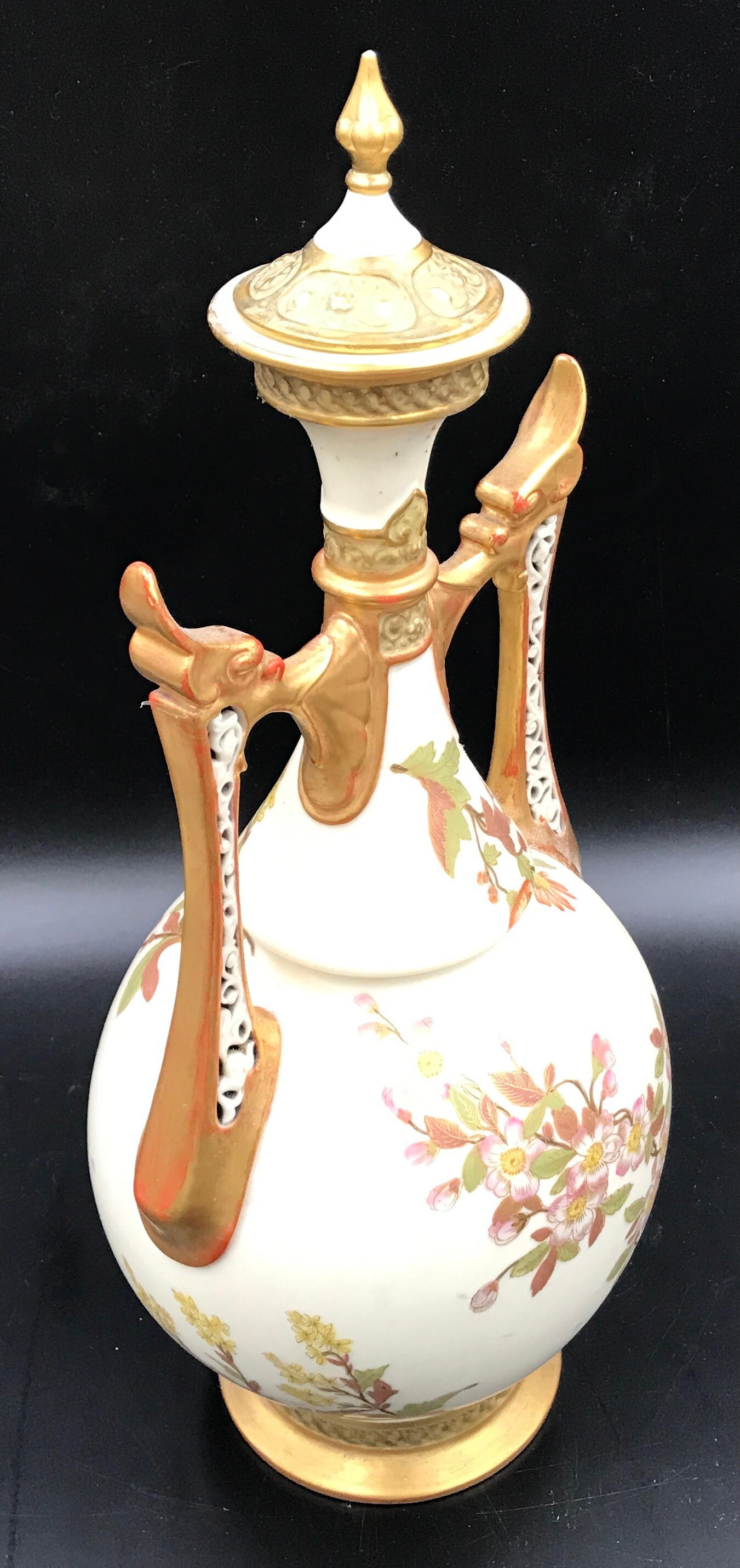 A Royal Worcester lidded vase with floral decoration and pierced dragon headed handles. 41cms. - Image 5 of 7