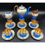 A Japanese Samurai China 15 piece coffee set with blue ground and gilt decoration. Coffee Pot