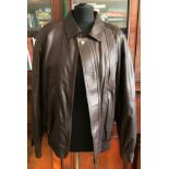 Three lined gentleman's leather jackets to include a brown bomber style size medium, a black