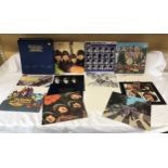 The Beatles LP collection, 13 vinyl LPs with posters, blue presentation box. Parlaphone, facsimile