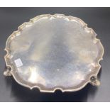 Fine early salver with pie crust edge, centre crest on pronounced feet. London 1733 prob. by John