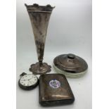 Silver to include a pocket watch Birmingham 1919, vase Birmingham 1914, a dressing table dish London