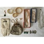 A collection of vintage jewellery to include a pair of fine cream leather gloves with sewn on