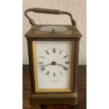 A brass cased carriage clock by J. W. Benson 11.5cms h. Serial number 18268.