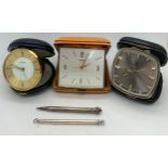 Two Swiza and one Uti design travelling alarm clocks, continental silver propelling pencil and