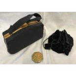 A 1950's black clasp handbag 24cmx 15cm, a small black velvet draw string handbag and a 1950's