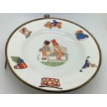 An early 2othc child's nursery warming plate 20cms d.Condition ReportScratches to surface and