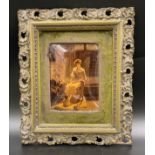 A framed crystoleum of a seated lady with a baby. 13cms x 9cms. Frame 26cms x 22cms.Condition