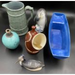 A selection of ceramics to include a blue Holkham pottery boat 42 x 15cms, an Aviemore Pottery