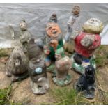 Nine small garden ornaments to include duck, gnomes, seal, lady etc. Tallest 44cms.Condition