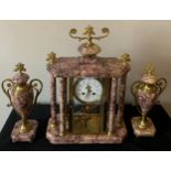 A French Garniture marble clock inscribed Laroot & Boyon. 8 day striking with mercury compensating
