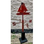 Vintage metal sailing ship weather vane mounted on a wooden base. 81cms h.Condition ReportWear to