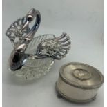 A cut glass and .925 silver swan together with a silver musical box. London 1979.Condition