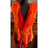 An orange suede fur trimmed gillet, size S, together with 2 Peruvian connection dresses, one M and
