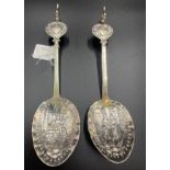 Pair of hand chased Dutch silver spoons with cockerel mounts c1800. They have a sterling silver mark