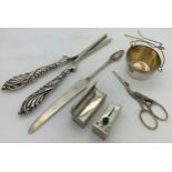 Silver handled curling tongs, Birmingham 1903 with lipstick case marked .800 set with cabochon green