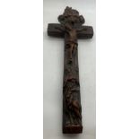 A well carved crucifix with sliding compartment to rear, 24cms l.Condition ReportTiny chip to rear.