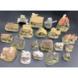 A quantity of Lilliput Lane and David Winter cottages to include Cotswold Cottage, The Model Daisy
