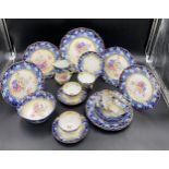 A fine continental porcelain "Viersa" tea service with cobalt. floral and gilding decoration