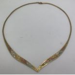 A tricolour 9ct gold necklace. 9.9gms.Condition ReportGood condition.